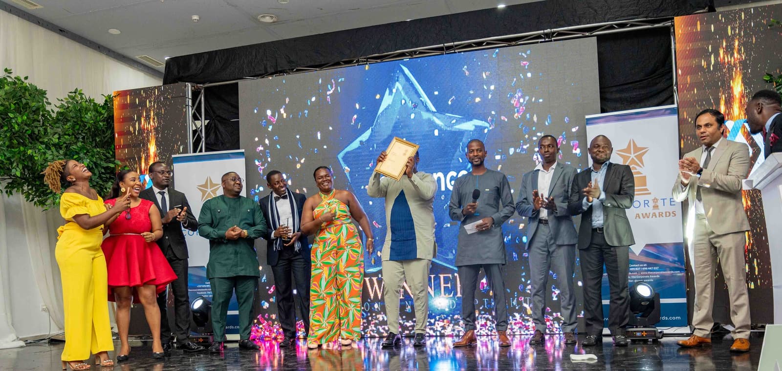Winners gathered on stage under confetti at The Corporate Awards Cameroon 2023